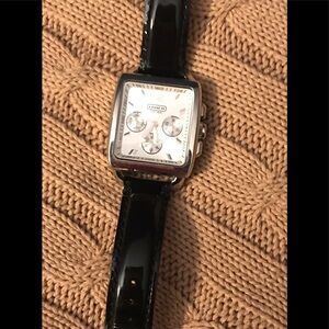 Coach watch/working battery.  *Please note scratch mark on case back.